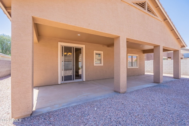 1956 N Hubbard Ln, Casa Grande, AZ 85122 - exterior space with visible vents, fence, stucco siding, and a patio area