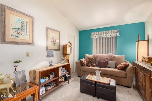 living room with light carpet and vaulted ceiling