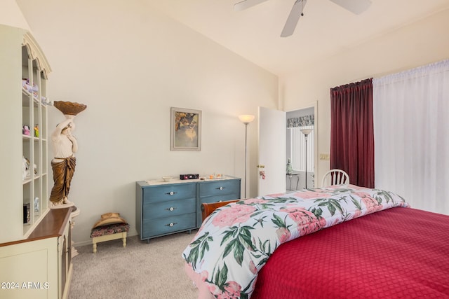 carpeted bedroom featuring ceiling fan and lofted ceiling