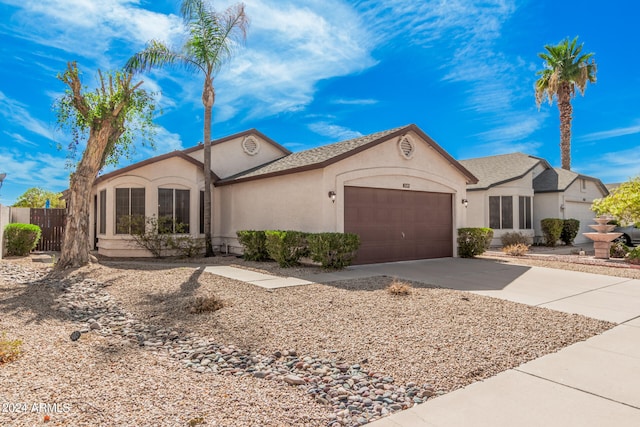 single story home with a garage