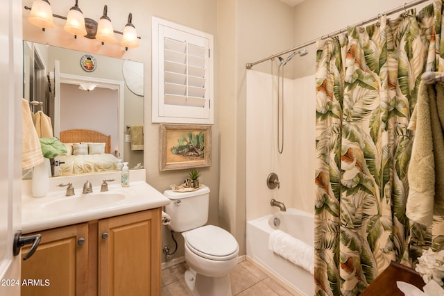 full bathroom featuring toilet, shower / bath combo, vanity, and tile patterned floors