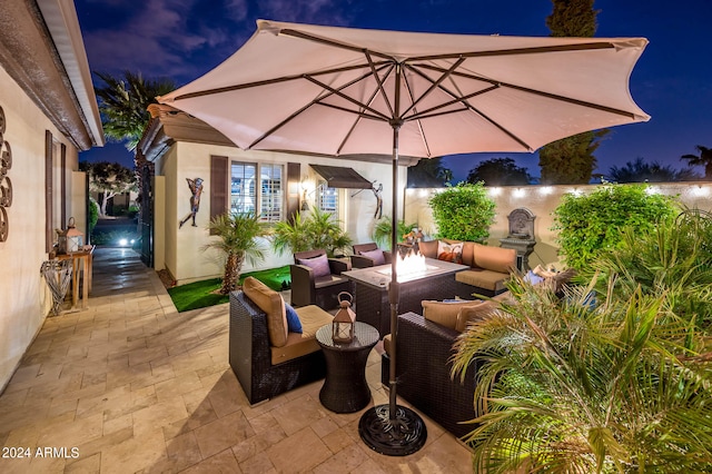 patio at night with outdoor lounge area