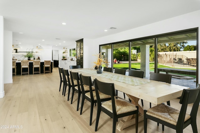 dining room featuring light hardwood / wood-style flooring