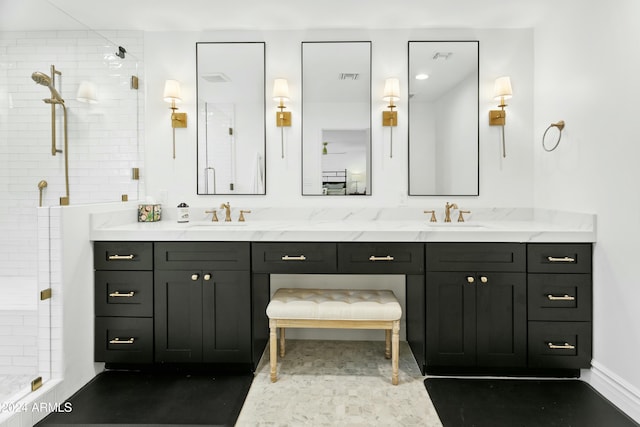 bathroom with vanity and an enclosed shower