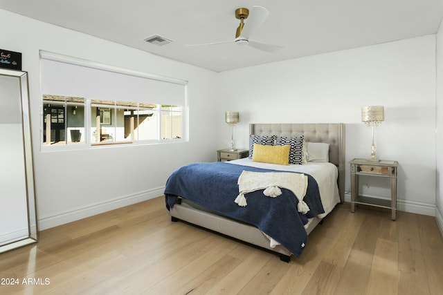 bedroom with hardwood / wood-style flooring and ceiling fan