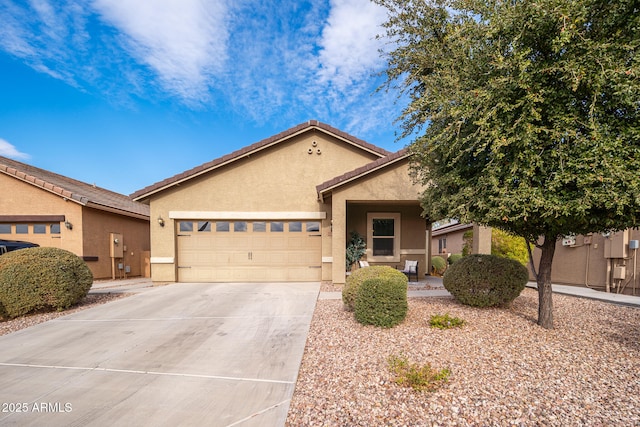 view of front of property with a garage