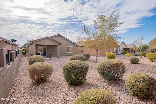 view of front of home featuring a patio area