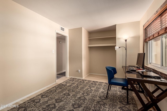 4245 E Yawepe St, Phoenix, AZ 85044 - home office featuring baseboards, visible vents, and wood finished floors