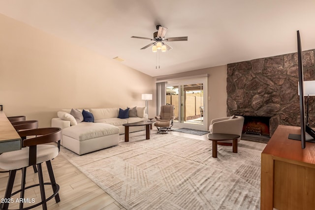 4245 E Yawepe St, Phoenix, AZ 85044 - living area featuring a ceiling fan, visible vents, wood finished floors, and a fireplace