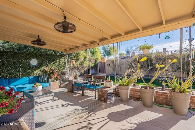 view of patio with an outdoor hangout area and ceiling fan