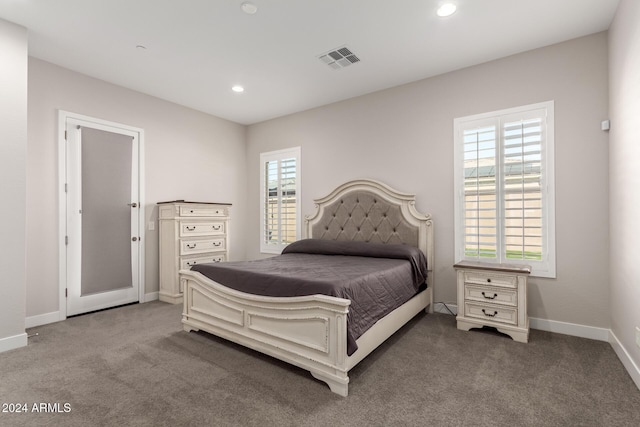 bedroom featuring carpet