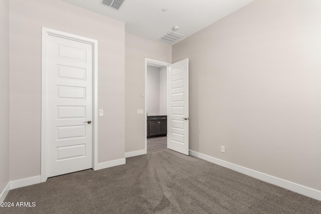 unfurnished bedroom with carpet