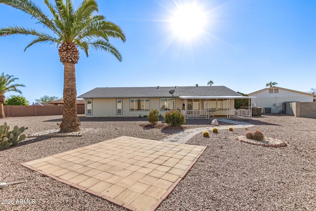 rear view of property with a patio area