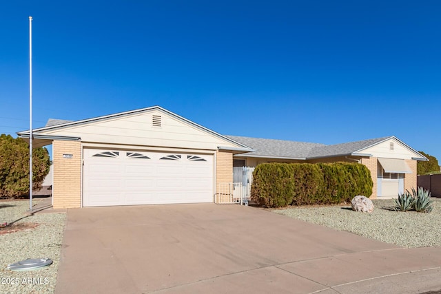 single story home with a garage