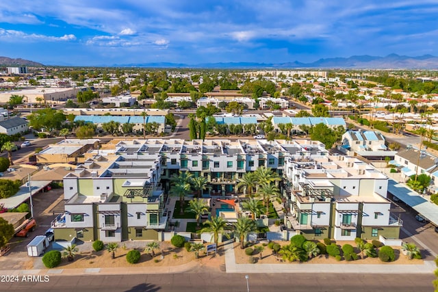 birds eye view of property featuring a mountain view and a residential view
