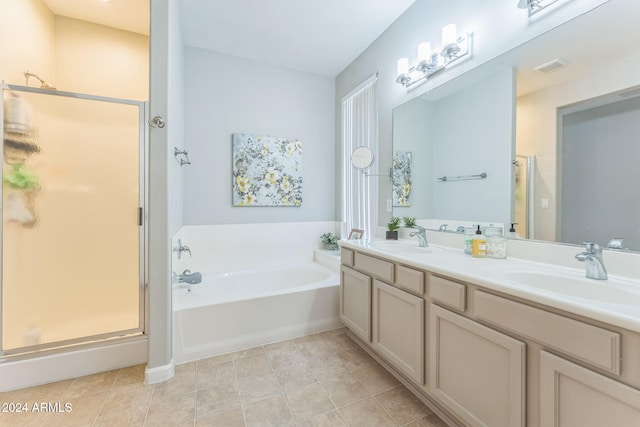 bathroom with vanity, tile patterned floors, and separate shower and tub