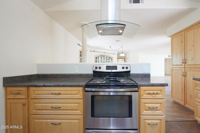 kitchen with light brown cabinets and electric stove