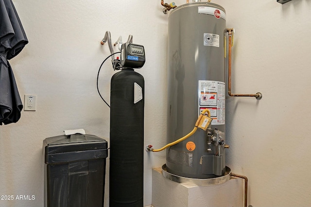 utility room with water heater