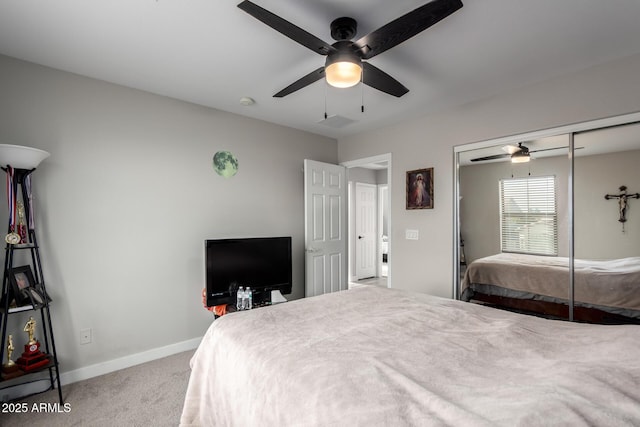 bedroom featuring carpet, a closet, a ceiling fan, and baseboards