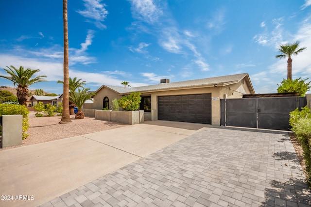 single story home with a garage