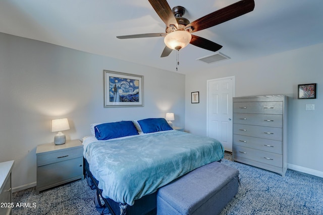 bedroom featuring light colored carpet and ceiling fan