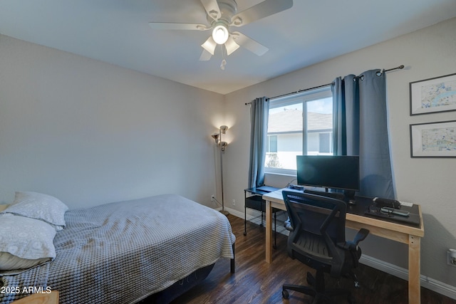 bedroom featuring dark hardwood / wood-style floors and ceiling fan