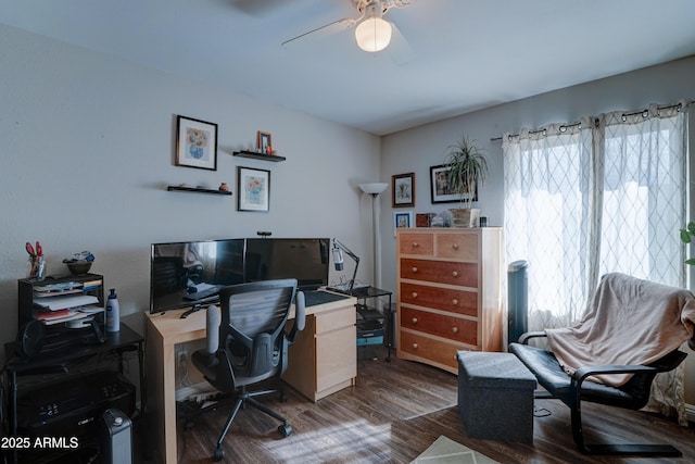 office space featuring dark wood-type flooring and ceiling fan