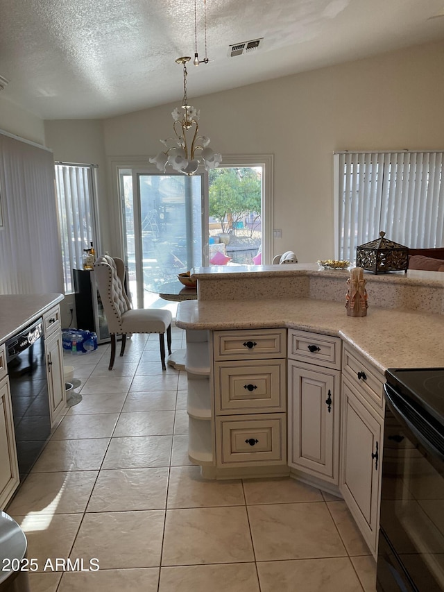 kitchen featuring pendant lighting, an inviting chandelier, light tile patterned floors, black appliances, and a textured ceiling