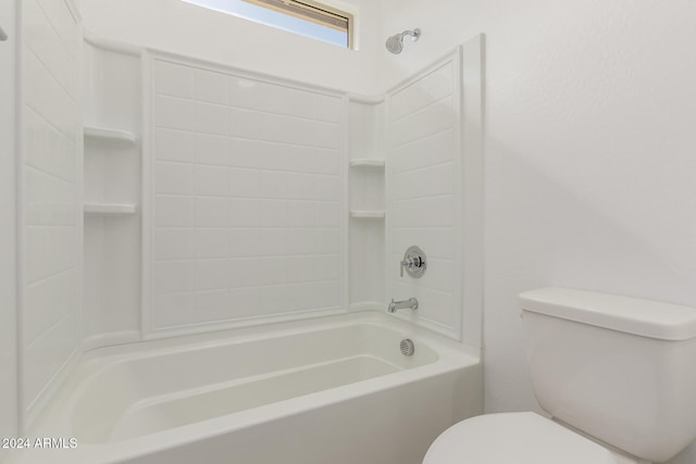 bathroom with shower / tub combination and toilet