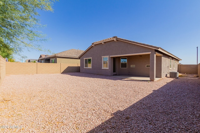 rear view of house with a patio