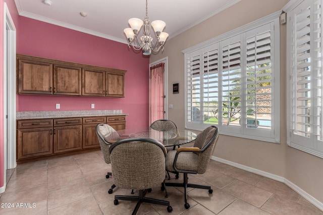 dining room with a notable chandelier, light tile patterned floors, and crown molding