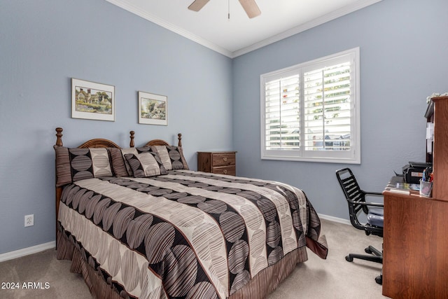 bedroom with ceiling fan, light colored carpet, and crown molding