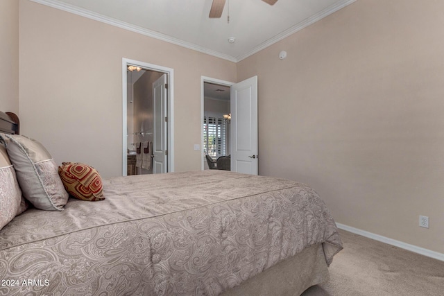 carpeted bedroom with ceiling fan, crown molding, and ensuite bath