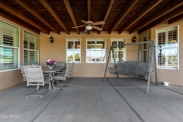 view of patio featuring ceiling fan