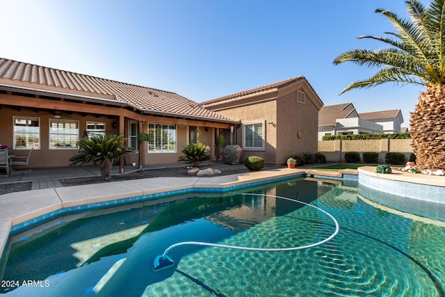 view of swimming pool featuring a patio