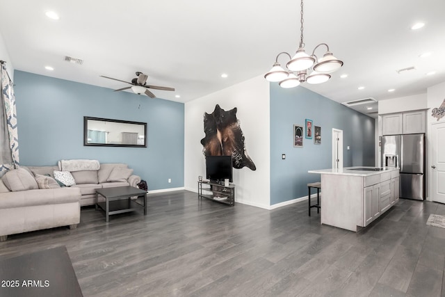 living room featuring dark wood-style flooring, recessed lighting, visible vents, ceiling fan, and baseboards