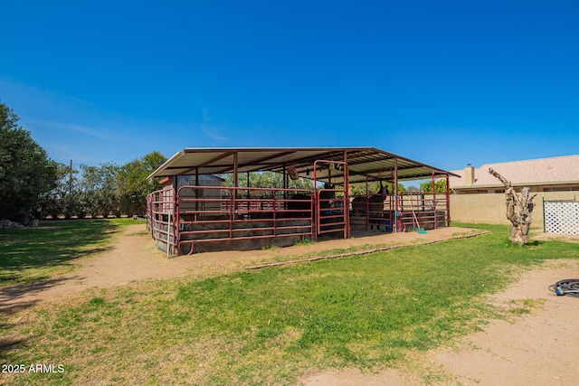 view of outdoor structure featuring an outbuilding and an exterior structure