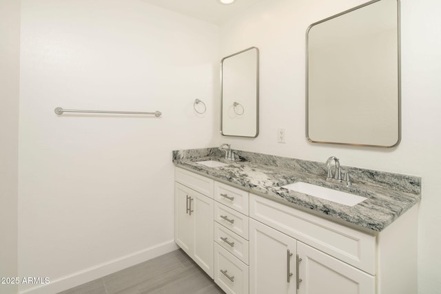 16 W Encanto Blvd Unit 22, Phoenix, AZ 85003 - full bath with baseboards and double vanity