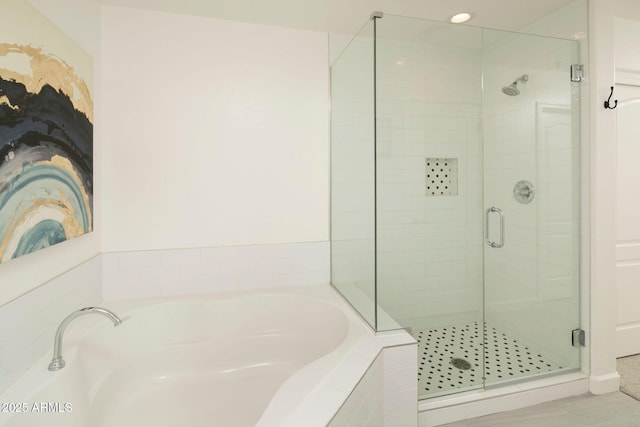 16 W Encanto Blvd Unit 22, Phoenix, AZ 85003 - bathroom featuring a bath, a stall shower, and tile patterned floors