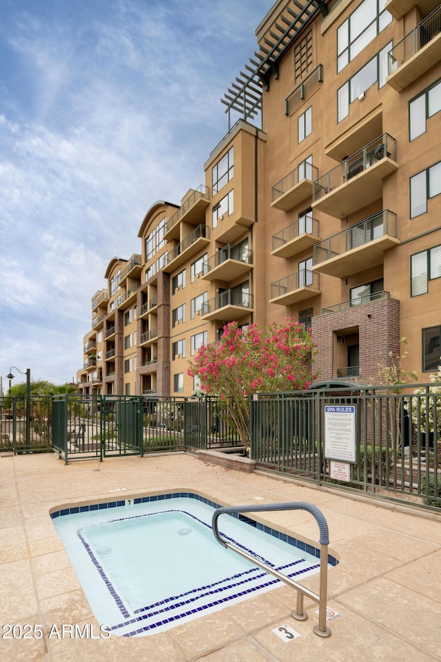 16 W Encanto Blvd Unit 22, Phoenix, AZ 85003 - view of swimming pool featuring fence
