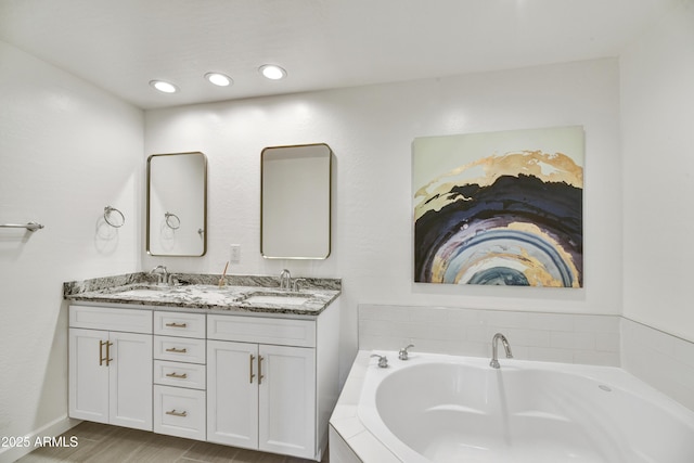 16 W Encanto Blvd Unit 22, Phoenix, AZ 85003 - bathroom with a bath and double vanity