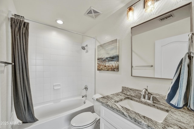 16 W Encanto Blvd Unit 22, Phoenix, AZ 85003 - bathroom featuring shower / bath combo, vanity, toilet, and recessed lighting