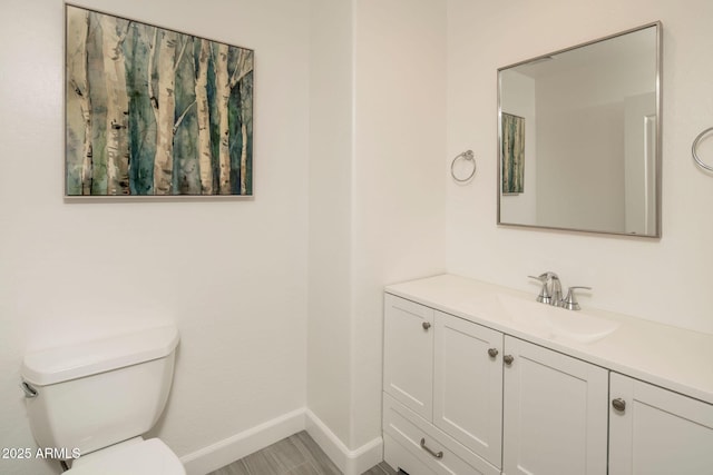 16 W Encanto Blvd Unit 22, Phoenix, AZ 85003 - half bath featuring baseboards, toilet, and vanity