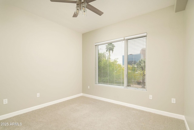 16 W Encanto Blvd Unit 22, Phoenix, AZ 85003 - spare room featuring light colored carpet, ceiling fan, and baseboards