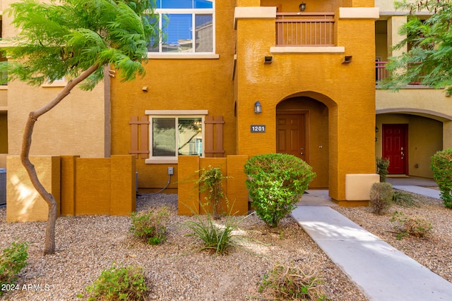 exterior space with a balcony