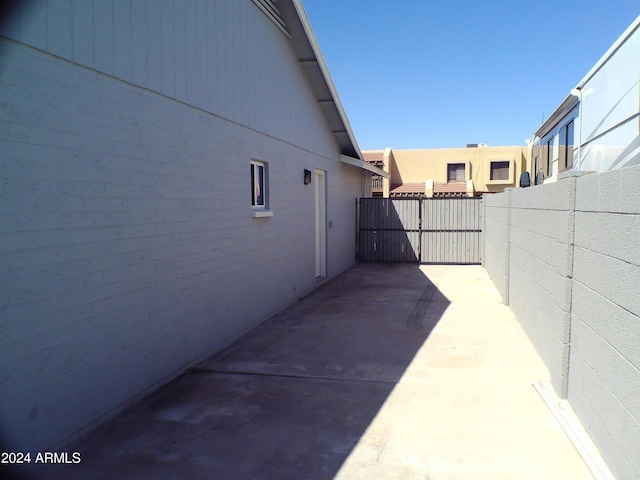 view of property exterior featuring a patio