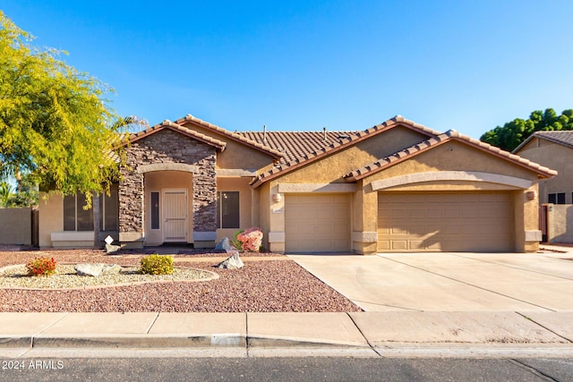 view of front of home featuring a garage