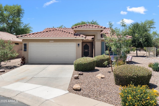 5024 S Citrus Ct, Gilbert, AZ 85298 - mediterranean / spanish home with a tile roof, stucco siding, an attached garage, and driveway