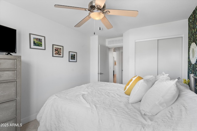 5024 S Citrus Ct, Gilbert, AZ 85298 - bedroom featuring a ceiling fan, a closet, and carpet floors