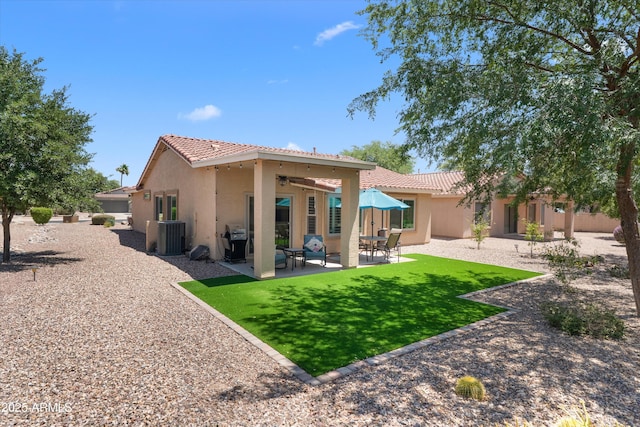 5024 S Citrus Ct, Gilbert, AZ 85298 - back of house with a tiled roof, stucco siding, ceiling fan, and a patio area